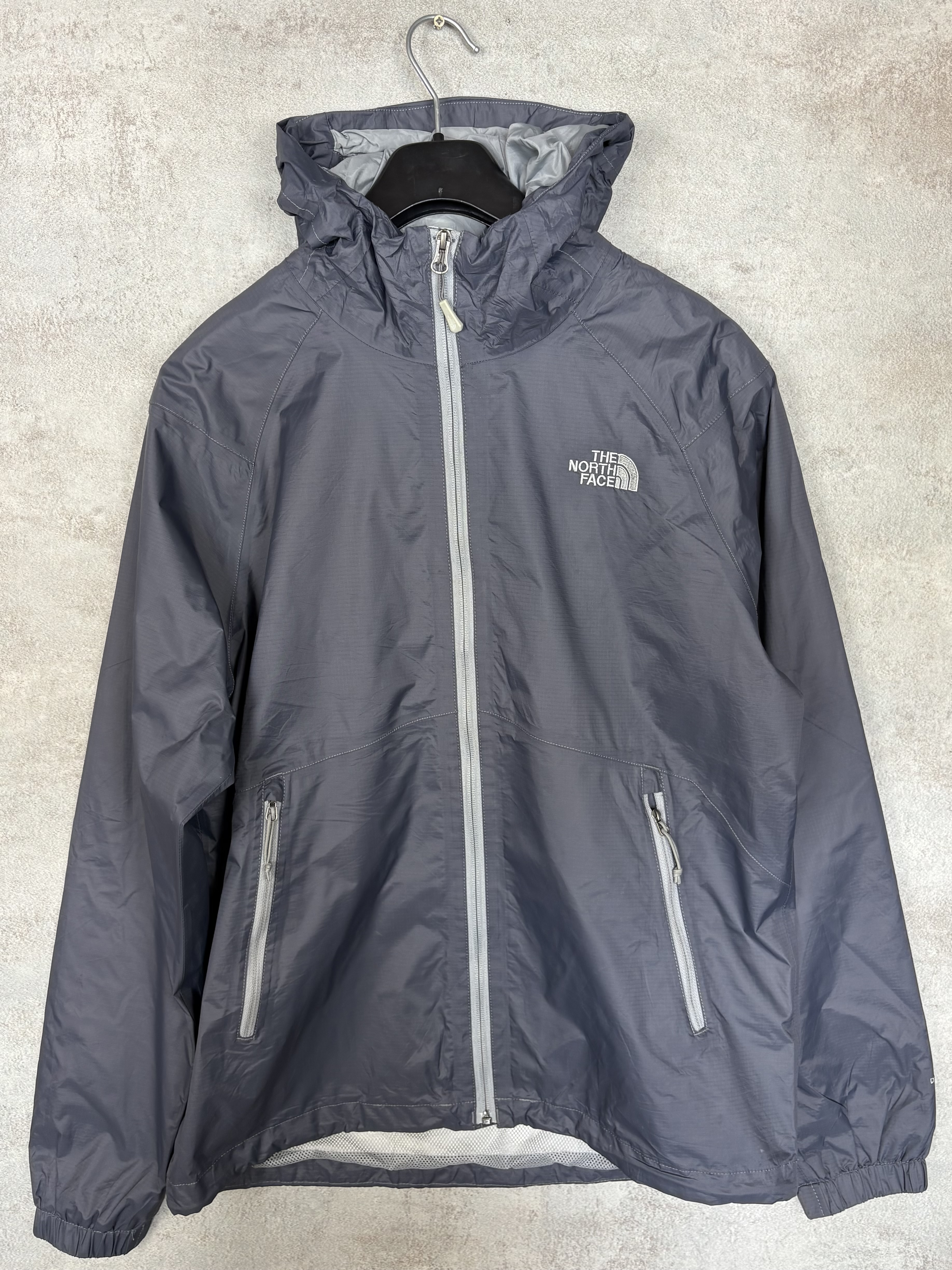 Veste coupe-vent grise The North Face (M)