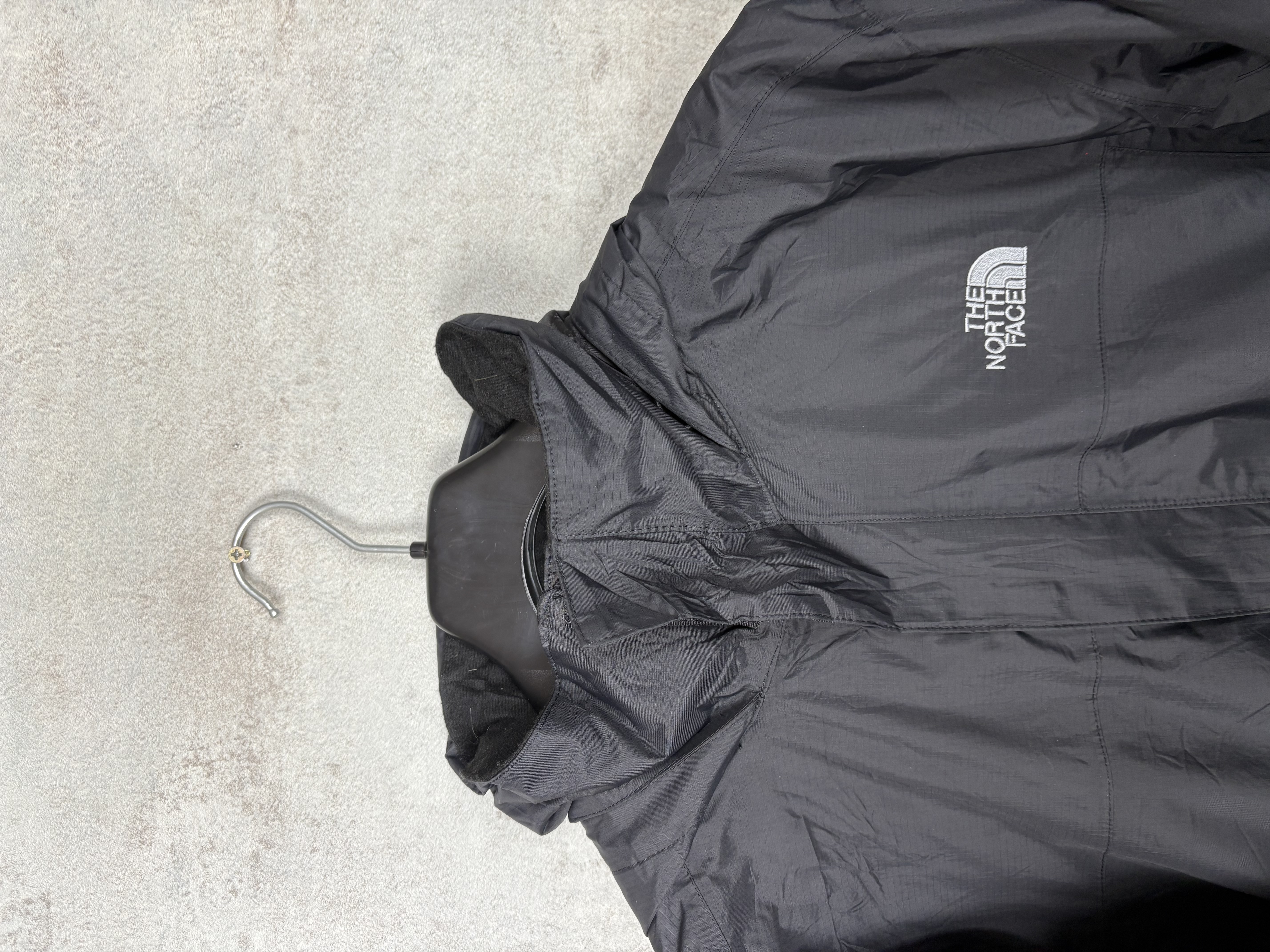 Veste coupe-vent noire The North Face (L)